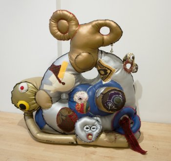 stuffed sculpture of creature